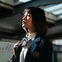 七七